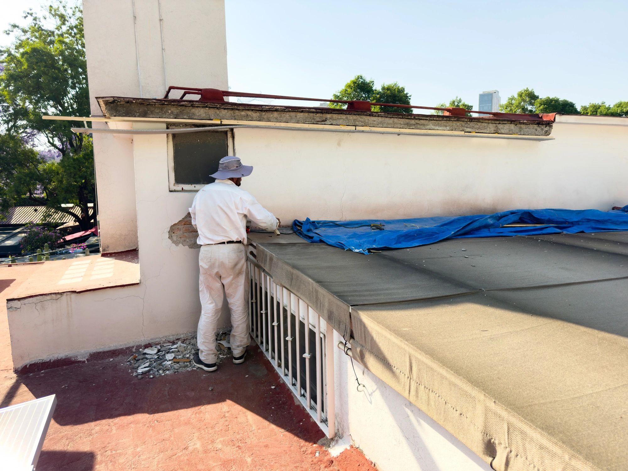 Tradesman working on a residential roof
